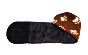 Flat view of a Cuddle Band male dog belly band in brown paw print style